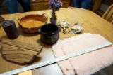 Floral, vases, basket, candle, shelf.