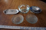 Serving bowls, plates, silver service pieces.