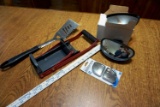 Grill utensil, mirror attachments, can crusher.