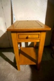 Solid wood bedside table.