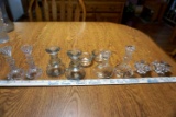 Assorted glass candle sticks.