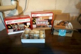 Village pieces, snowmen, candles.