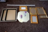 Picture frames, mirror, candleholders.