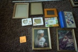 Picture frames, artwork, photo album.