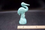 bird figurine.