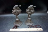 Cast iron Santa Claus bells.