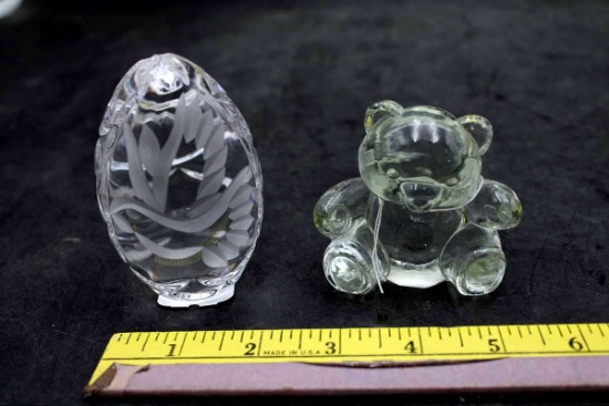 Glass, egg and teddy bear paperweights.