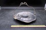 Silver service tray with handle.