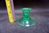 Green Depression glass candlestick.