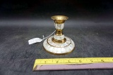 Brass candle holder with mother of Pearl design.