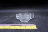 Miniature glass dish.