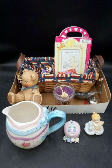 Figurines, glassware, basket, decor.