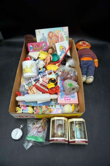 Disney figurines, ornaments, toys, Sesame Street, big bird, Smurfs, Bert and Ernie, and more.