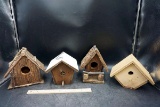 four bird houses.