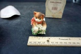 Calico kitten figurine.