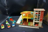 Fisher-price parking ramp and service center, elevator, cars, people, and more.