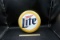 Styrofoam Miller Lite beer lid. Can be used as a cupholder or hung on the wall.
