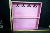Pink shelf.