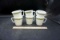 Six Pyrex coffee cups.