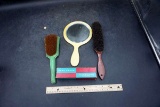 three brushes, mirror.