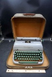 Remington typewriter and travel case.