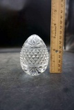 Egg glass paperweight.