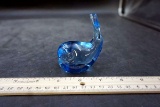 Blue whale glass paperweight.
