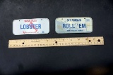 Souvenir bike license plates.