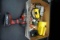 Box of tools, stud Finder, flashlight, drills, batteries, wrenches, and more.