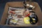 Box of tools, wire, iron, funnel, sockets, ratchet, keys. And more. Pocket knife.
