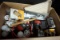 Box full of light bulbs, flashlights, supplies and more.