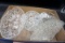 Box full of clear glass dishes.