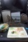 Metal basket, cutting board, pans, tin canister.