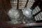 Basket full of clear glass.