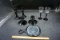 Black glassware, mirror, candle sticks.