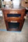 Glass top file cabinet.