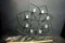 Metal art with candle holders.