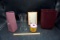 Assorted glassware, vases, string, artwork, wastebin.