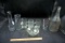 Assorted glassware, vases, bottles.