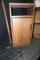 Cabinet with door.