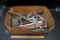 Box of tools, file, wrenches, screwdrivers, and more.
