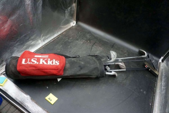 US kids, golf bag and golf clubs.