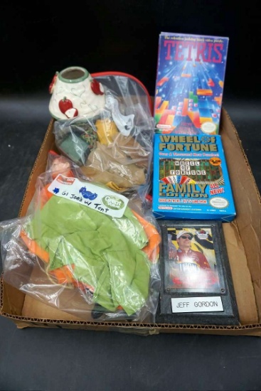Nintendo games. Tetris, Wheel of Fortune. Jeff Gordon plaque. GI Joe clothing. GI Joe action figure.