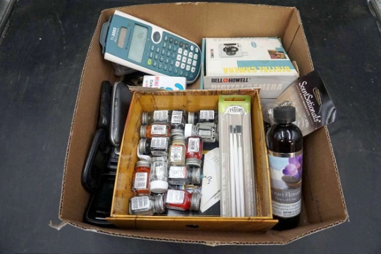 Bell and Howell digital camera, Texas Instruments calculator, cell phones,  model car paint.
