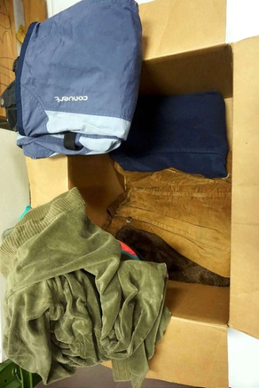 Box full of clothing. Corduroy.