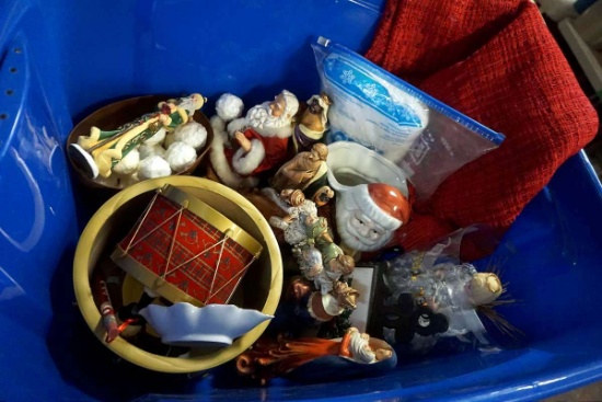 Tote full of Christmas decor, ornaments.