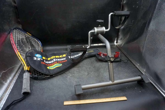 Tennis rackets, exercise equipment. Wilson protective eyewear.