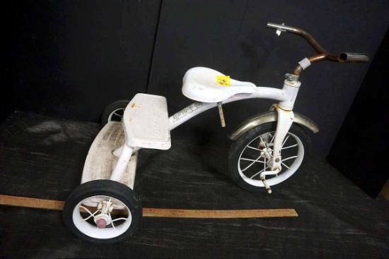 White metal tricycle. Radio flyer.