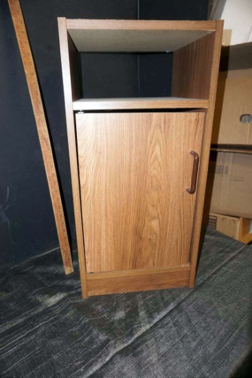 Cabinet with door.