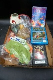 Nintendo games. Tetris, Wheel of Fortune. Jeff Gordon plaque. GI Joe clothing. GI Joe action figure.